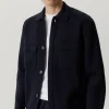La veste en tricot en laine mérinos