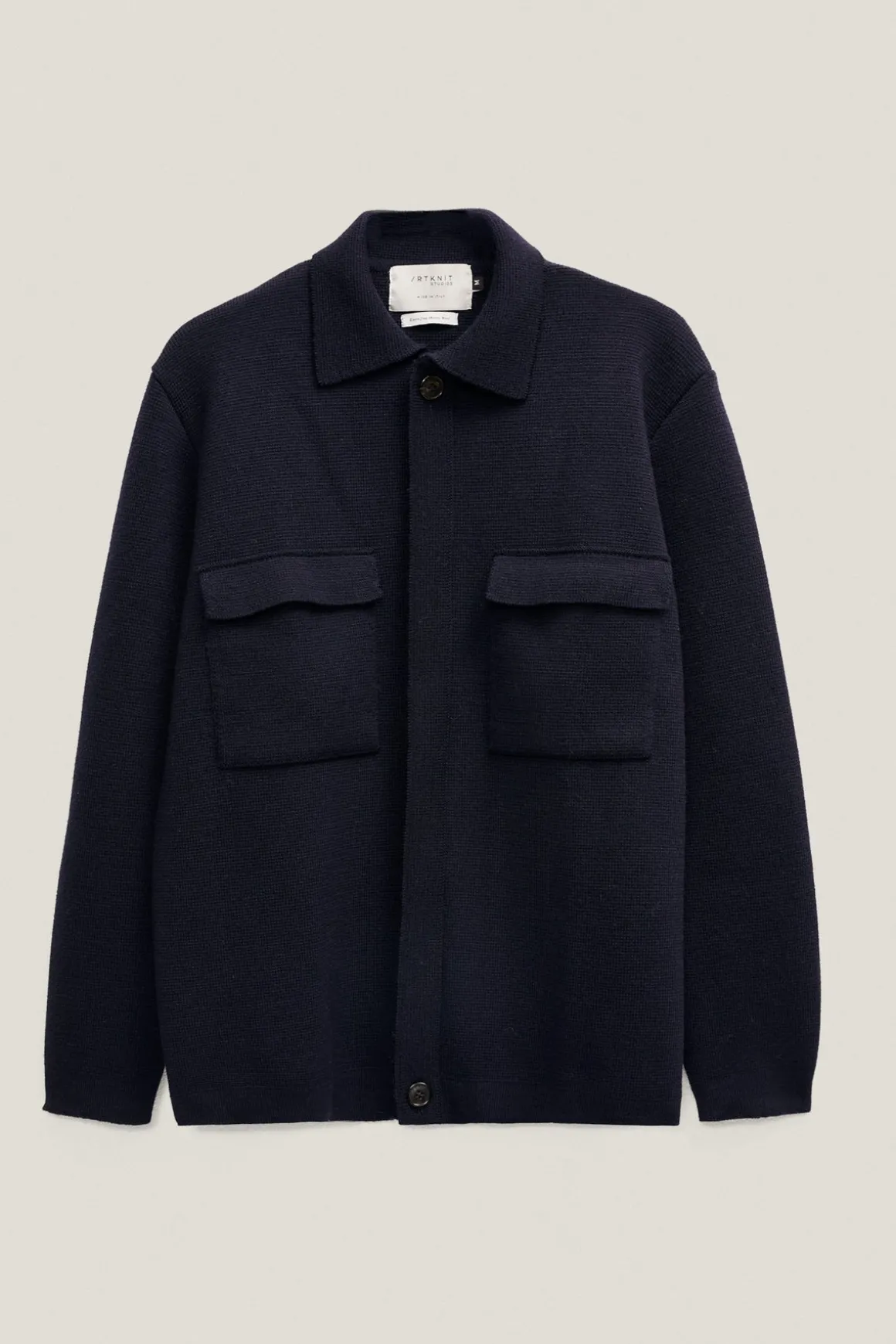 La veste en tricot en laine mérinos